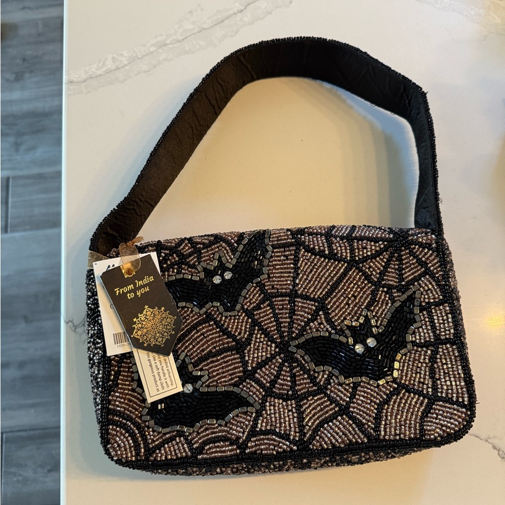 Viral beaded black and gold bat purse